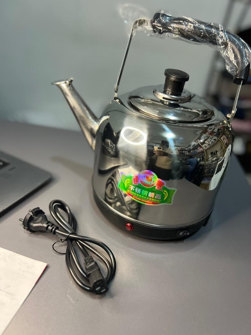 Tian Guang stainless steel electric whistling kettle